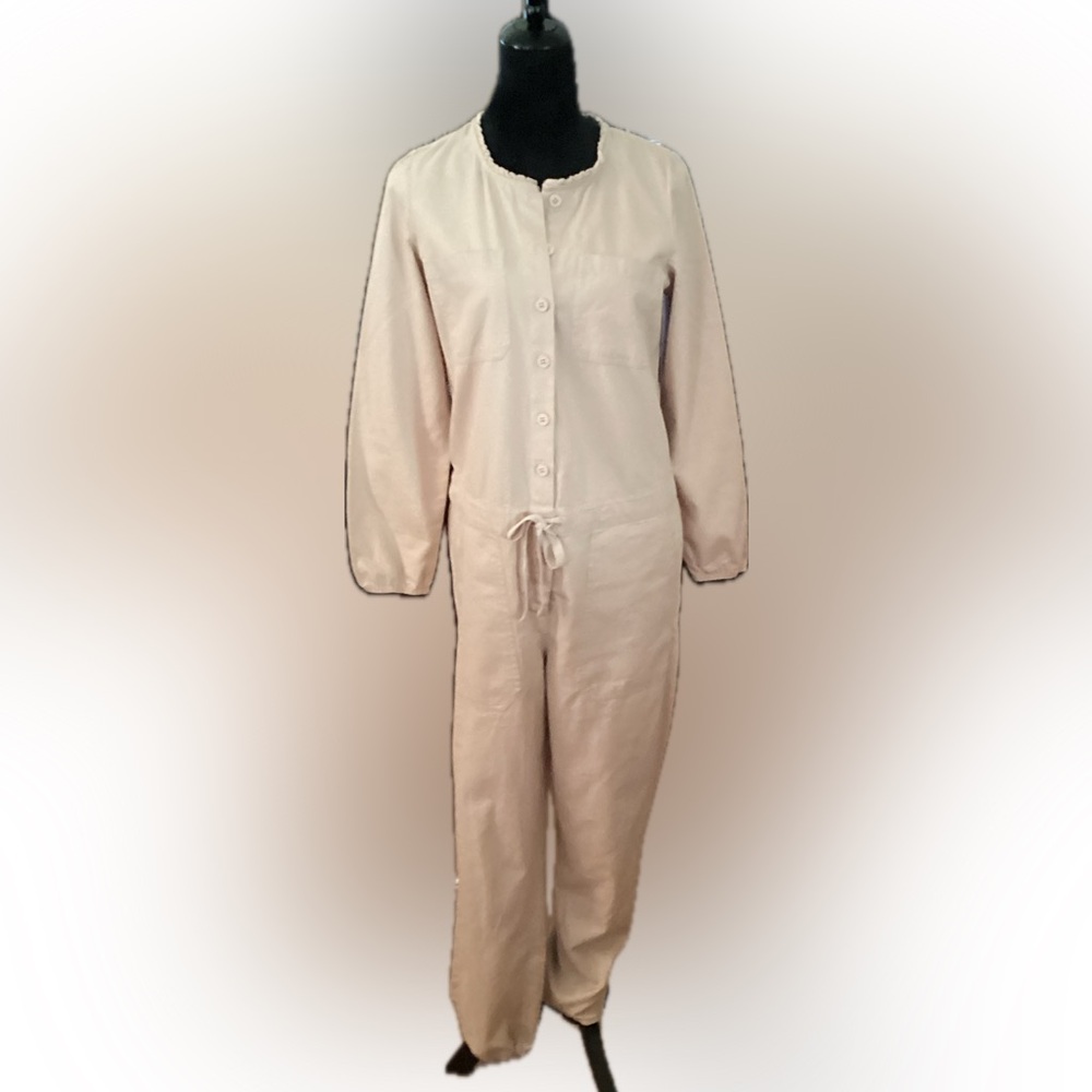 Aerie; beige long sleeve jumpsuit, button down front, elastic hems. Size XS NWOT